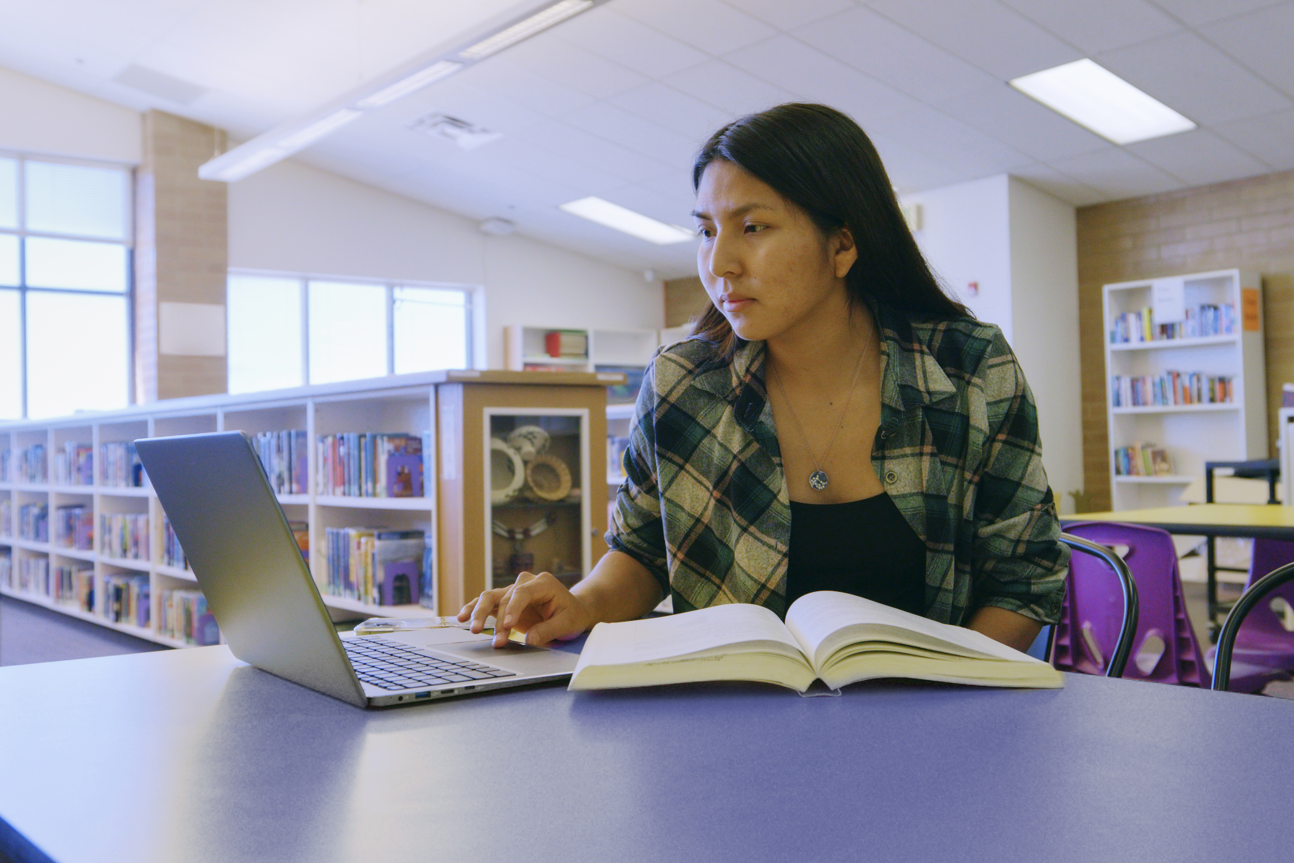 Indigenous student on computer