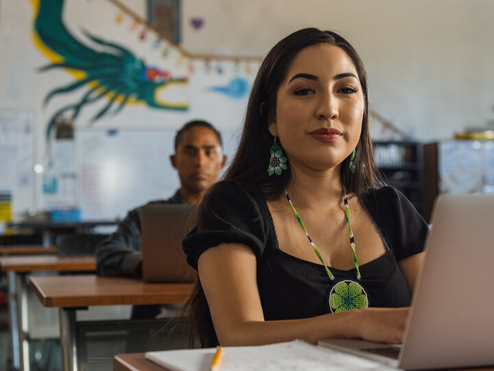 Native woman and man in a learning environment